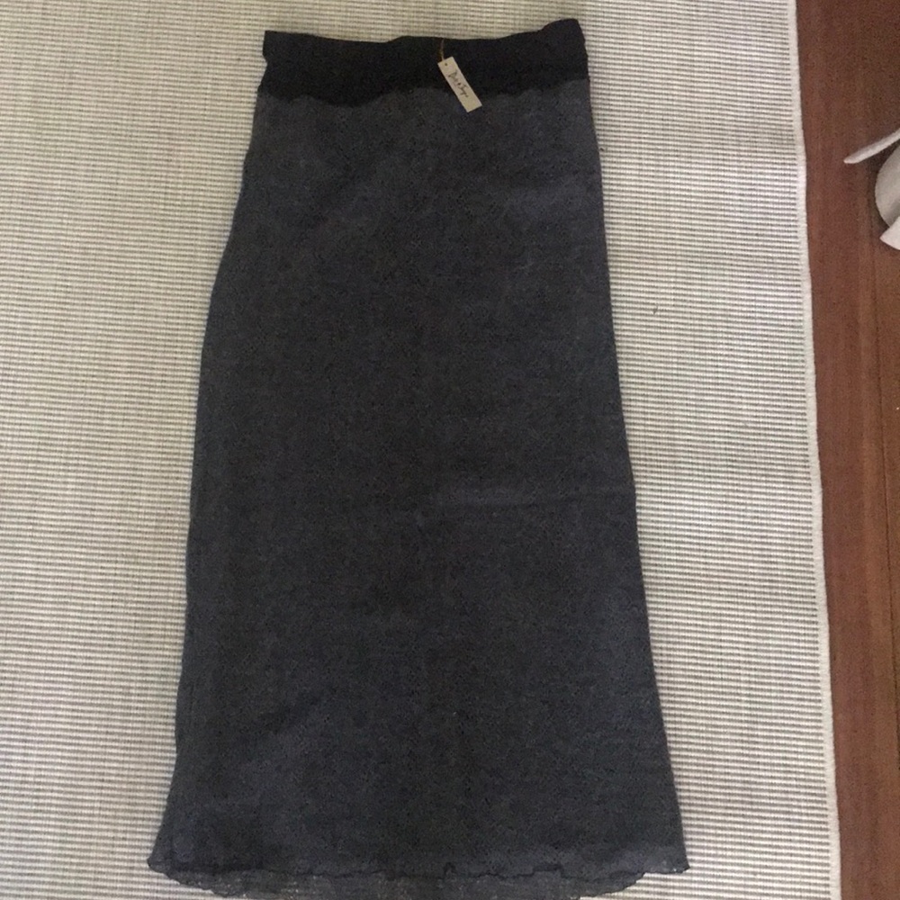 Dick and Jane vest and skinny skirt